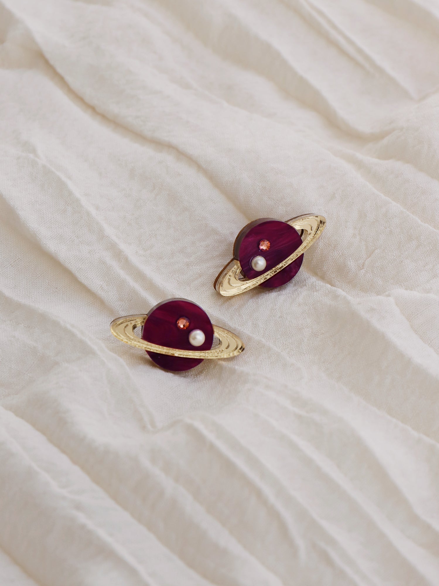 43. Saturn Studs in Cherry - Seconds